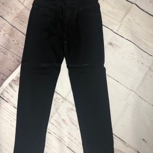 Black polyester skinny jeans.  Size 31